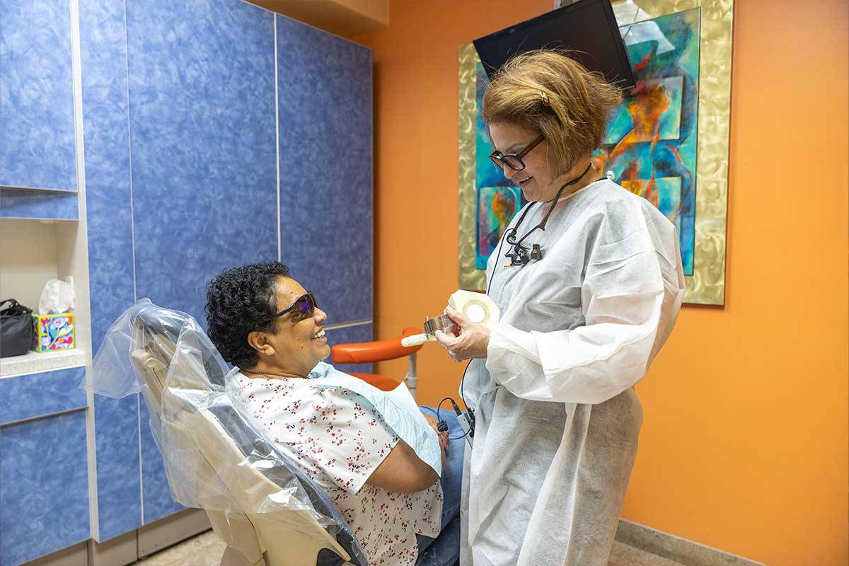 female patient receiving a smile makeover at Pinnacle Dental Group