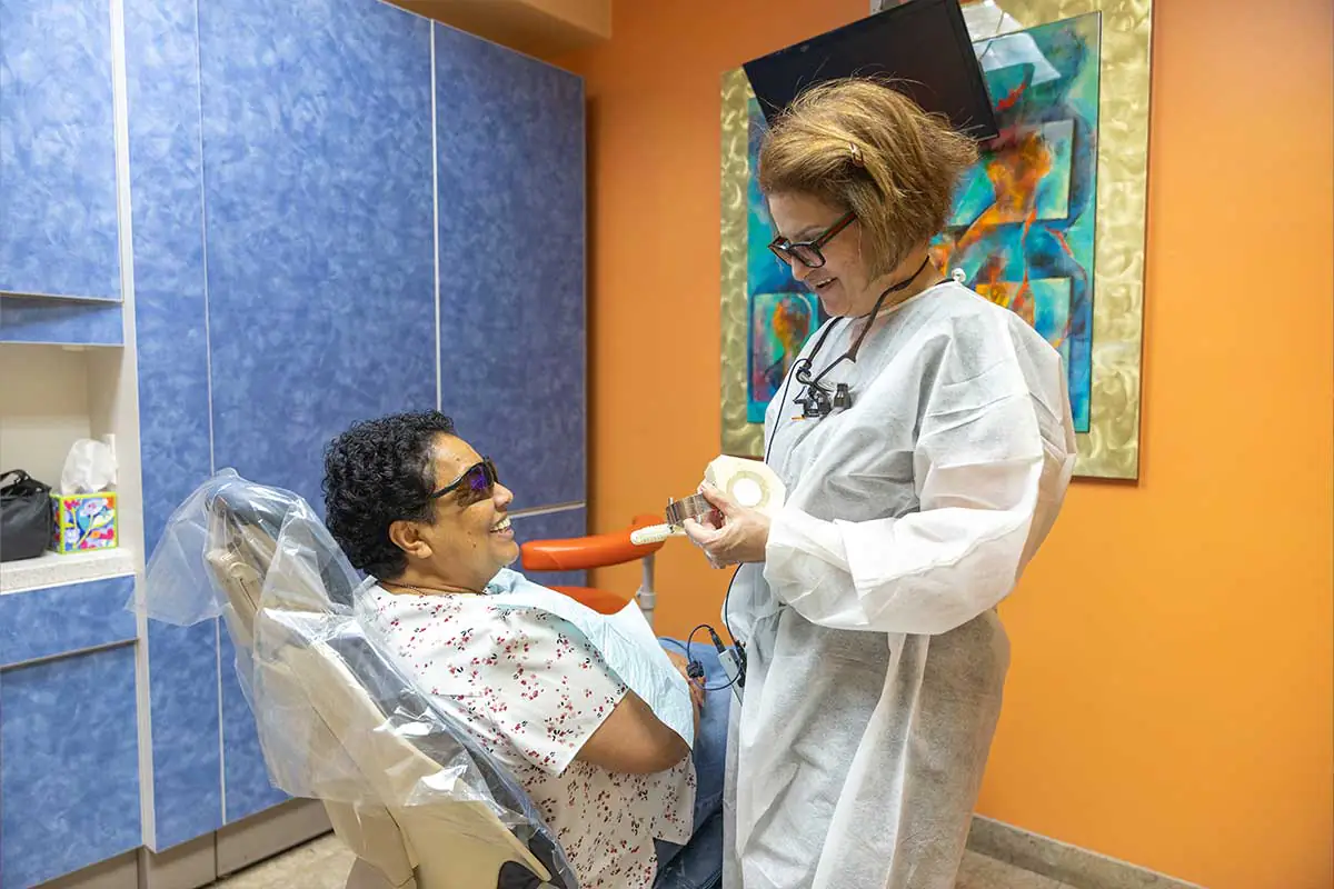female patient receiving a smile makeover at Pinnacle Dental Group